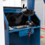Industrial welding equipment workshop with welding fume and dust extractor