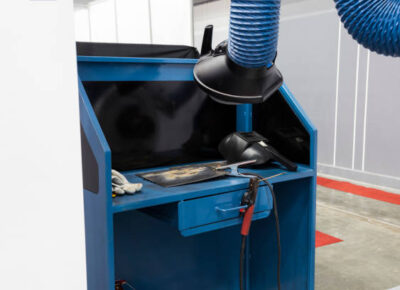Industrial welding equipment workshop with welding fume and dust extractor. Industrial welding equipment workshop with welding fume and dust extractor
