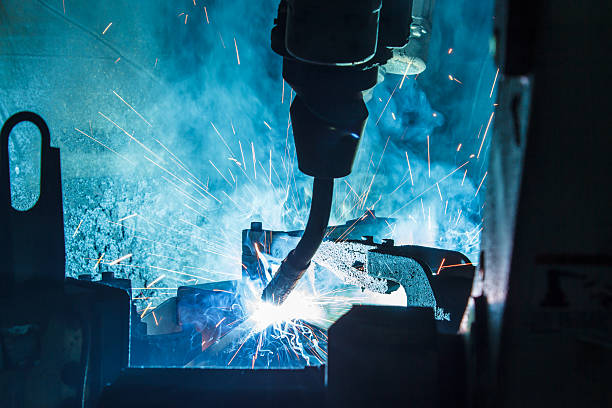 Welding robots movement in a car factory